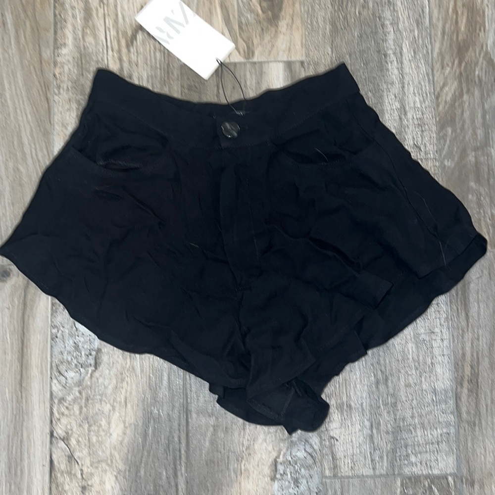 Black button shorts